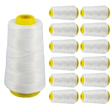 Image Катушки с белыми нитками для швейной машины для сумок